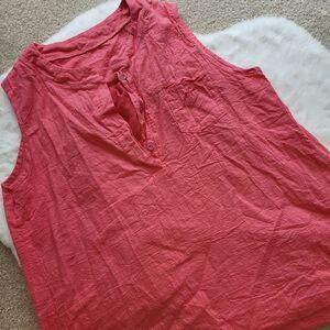 Sleeveless peach colored blouse with sheer back